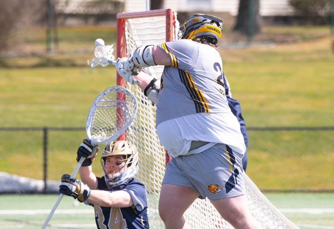 MCLA's Boden Dock scoring his second goal of the game against SUNY Canton this afternoon.